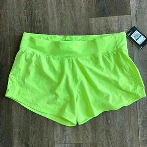 Under Armour Shorts.  Women’s size XL.  Bright neon green.  New with tags.